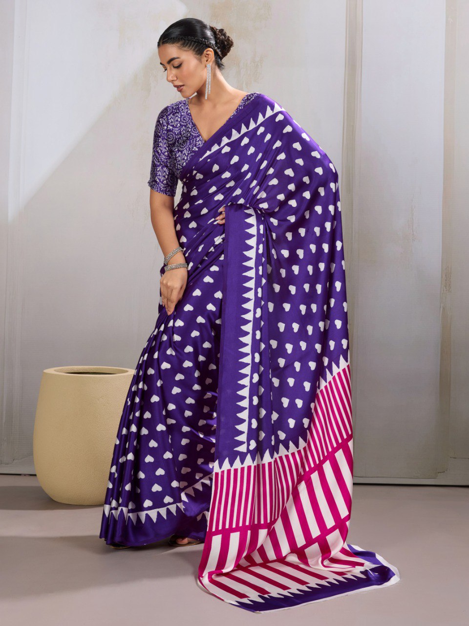 Pure Ajrakh modal satin fabric featuring traditional printed motifs with rich, earthy tones and a soft, breathable feel, perfect for all-day elegance.