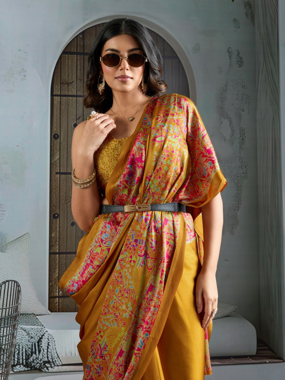 Pure Ajrakh modal satin fabric featuring traditional printed motifs with rich, earthy tones and a soft, breathable feel, perfect for all-day elegance.
