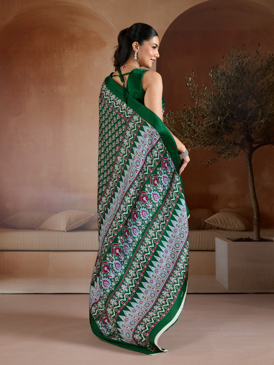 Pure Ajrakh modal satin fabric featuring traditional printed motifs with rich, earthy tones and a soft, breathable feel, perfect for all-day elegance.