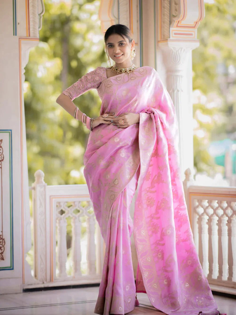 The richly crafted border and opulent pallu showcase traditional Banarasi Silk sarees