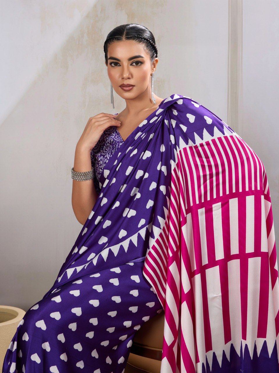 Pure Ajrakh modal satin fabric featuring traditional printed motifs with rich, earthy tones and a soft, breathable feel, perfect for all-day elegance.