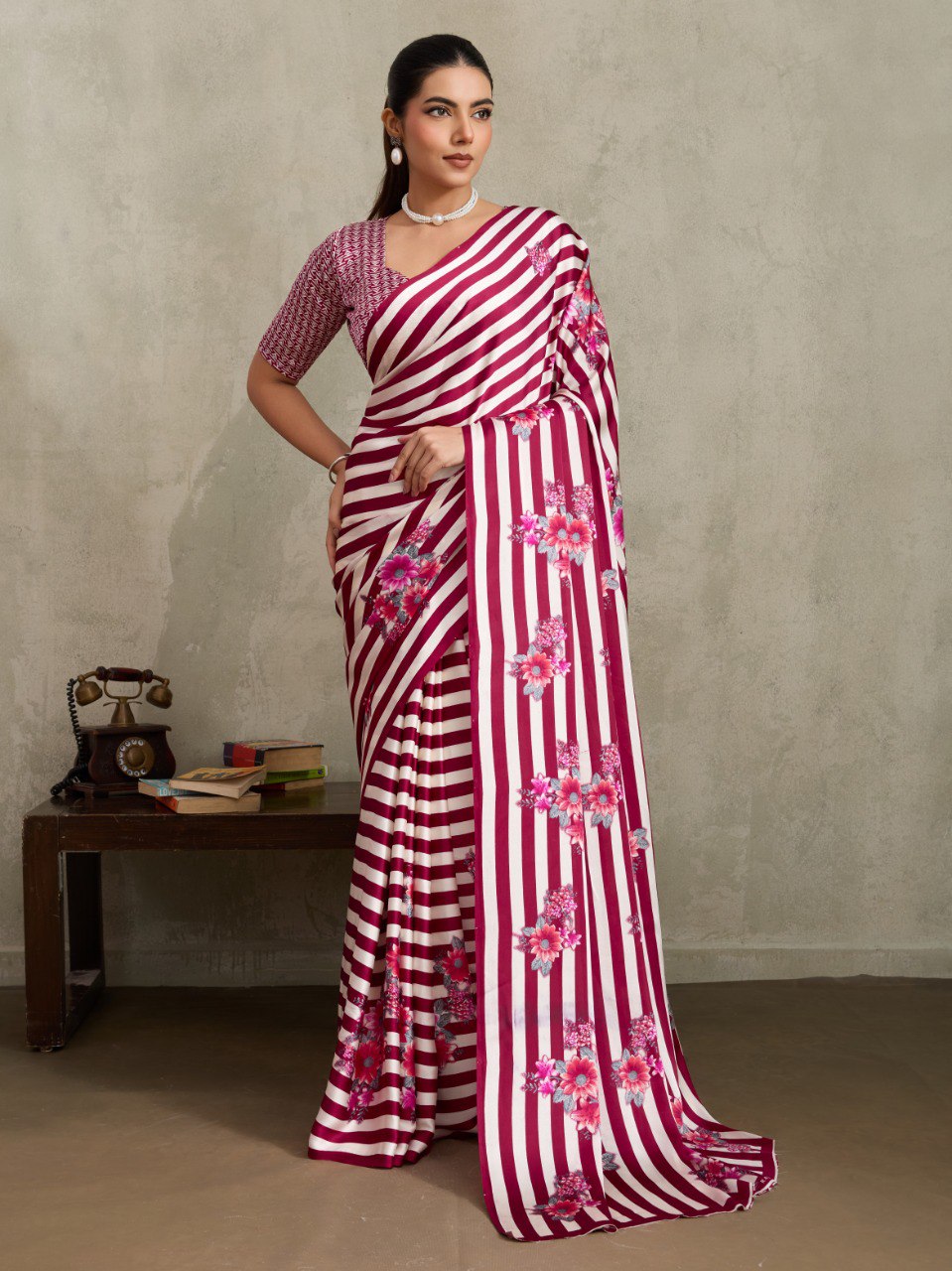 Pure Ajrakh modal satin fabric featuring traditional printed motifs with rich, earthy tones and a soft, breathable feel, perfect for all-day elegance.