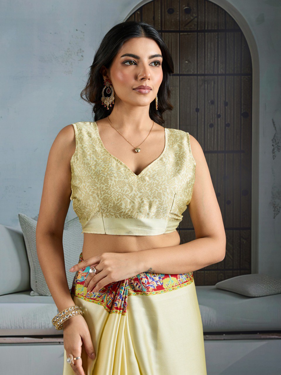 Pure Ajrakh modal satin fabric featuring traditional printed motifs with rich, earthy tones and a soft, breathable feel, perfect for all-day elegance.