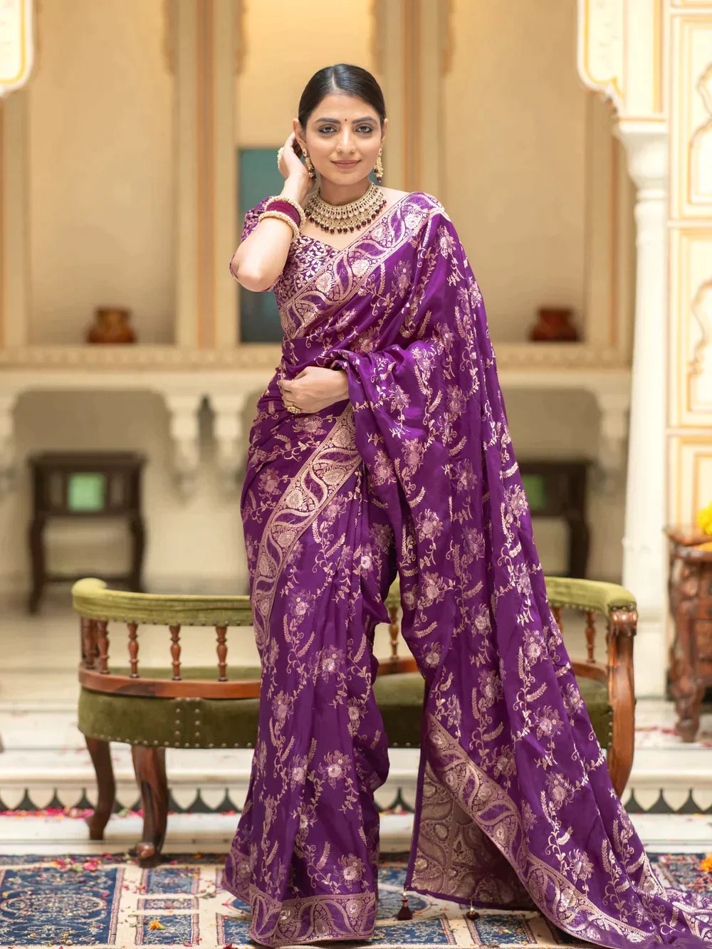 The richly crafted border and opulent pallu showcase traditional Banarasi Silk sarees