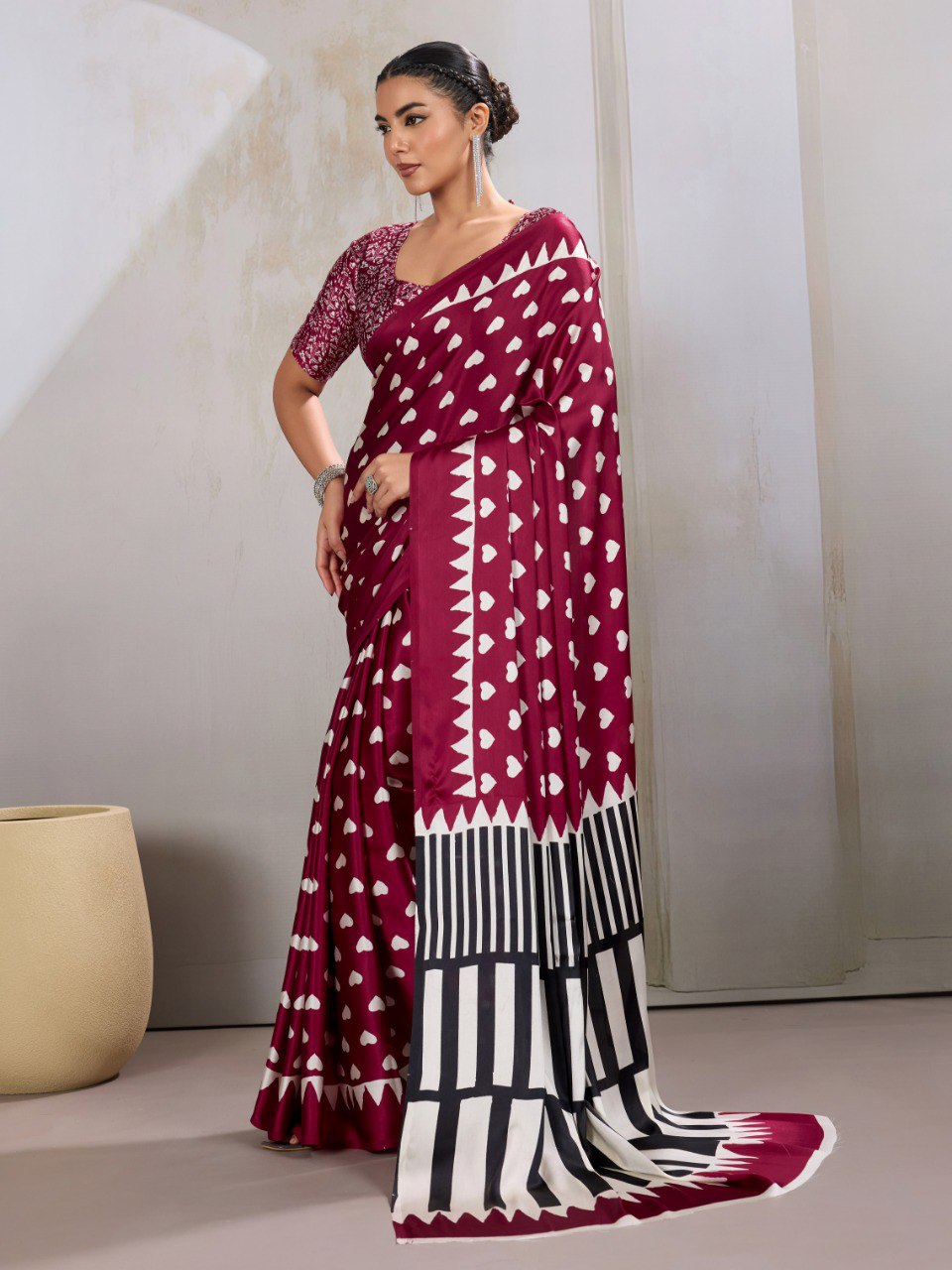 Pure Ajrakh modal satin fabric featuring traditional printed motifs with rich, earthy tones and a soft, breathable feel, perfect for all-day elegance.