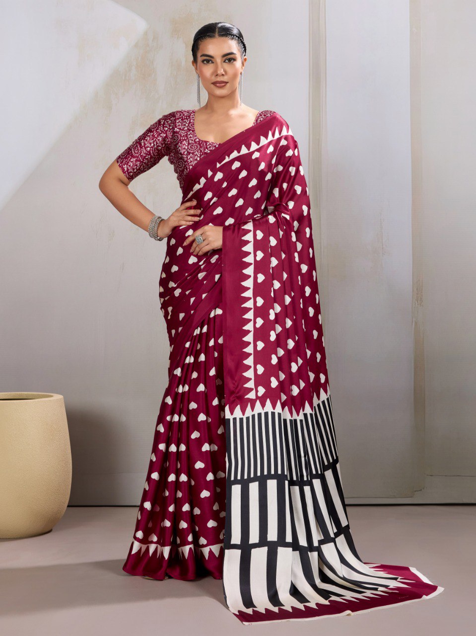 Pure Ajrakh modal satin fabric featuring traditional printed motifs with rich, earthy tones and a soft, breathable feel, perfect for all-day elegance.