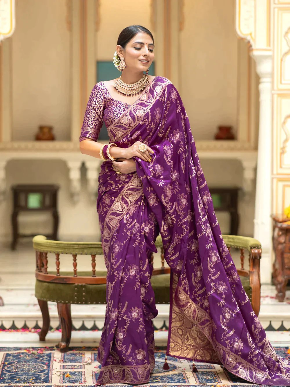 The richly crafted border and opulent pallu showcase traditional Banarasi Silk sarees