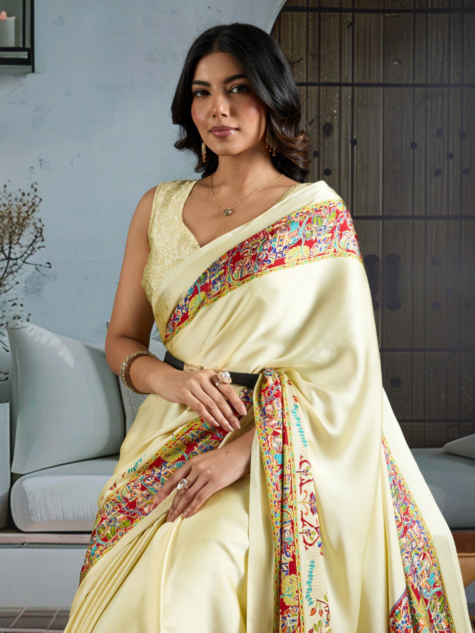 Pure Ajrakh modal satin fabric featuring traditional printed motifs with rich, earthy tones and a soft, breathable feel, perfect for all-day elegance.