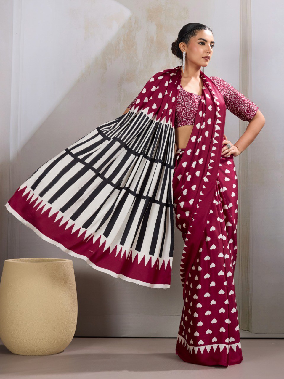Pure Ajrakh modal satin fabric featuring traditional printed motifs with rich, earthy tones and a soft, breathable feel, perfect for all-day elegance.