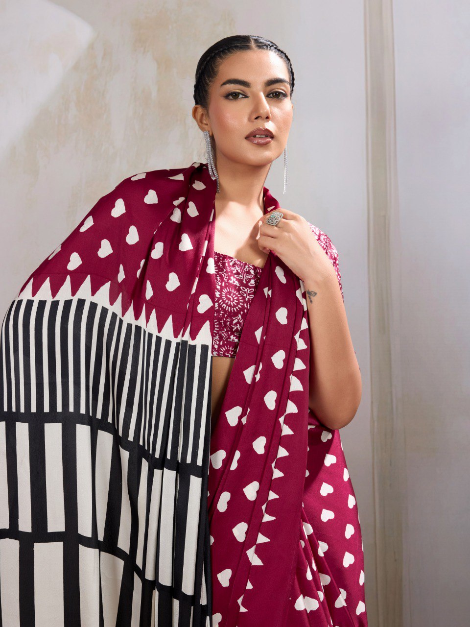 Pure Ajrakh modal satin fabric featuring traditional printed motifs with rich, earthy tones and a soft, breathable feel, perfect for all-day elegance.