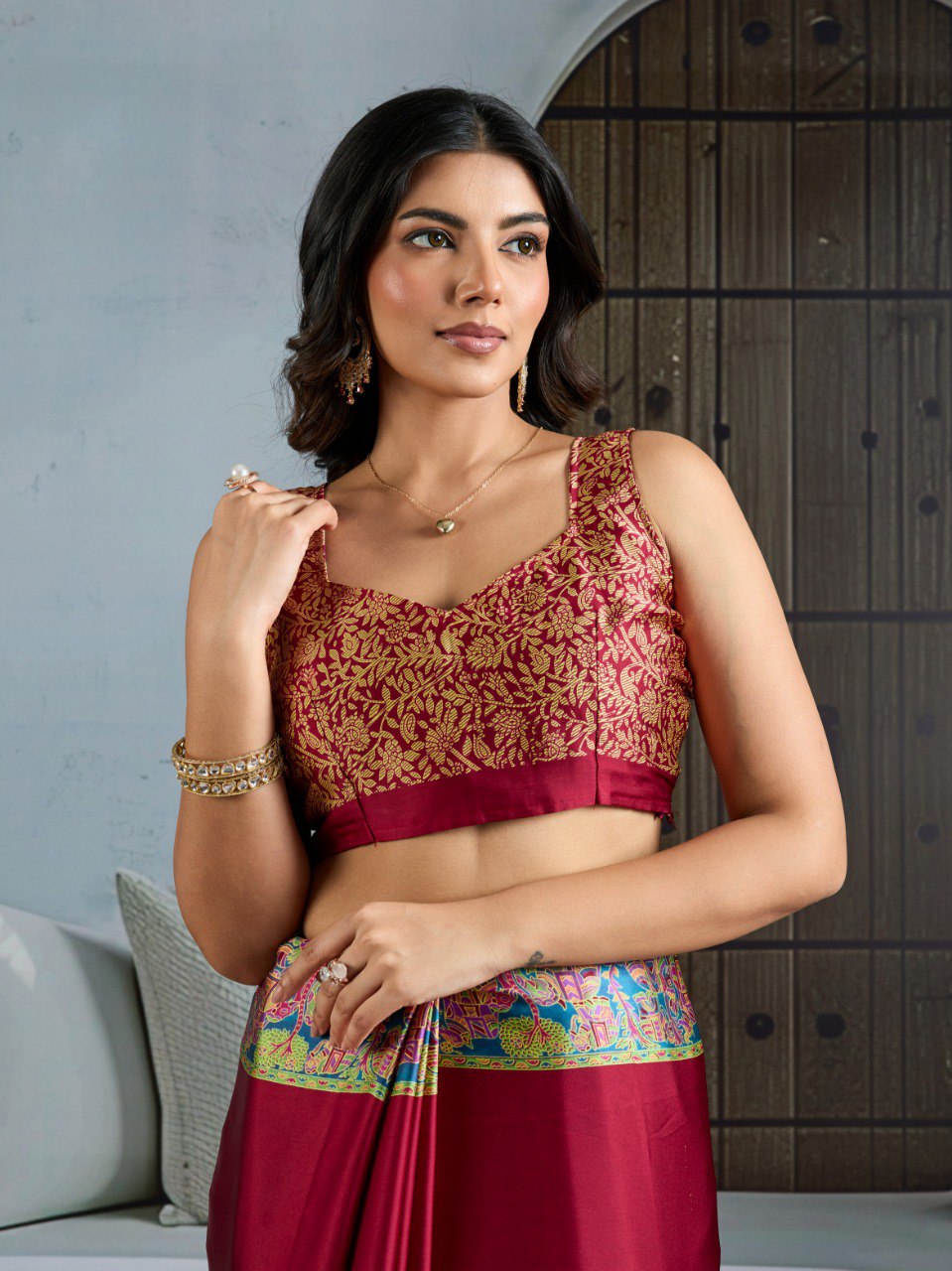 Pure Ajrakh modal satin fabric featuring traditional printed motifs with rich, earthy tones and a soft, breathable feel, perfect for all-day elegance.