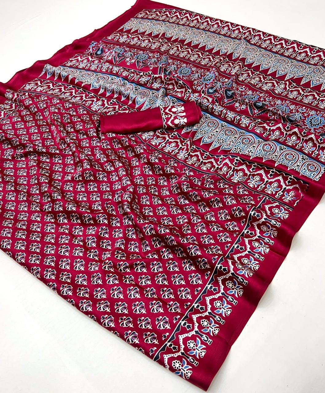 Pure Ajrakh modal satin fabric featuring traditional printed motifs with rich, earthy tones and a soft, breathable feel, perfect for all-day elegance.