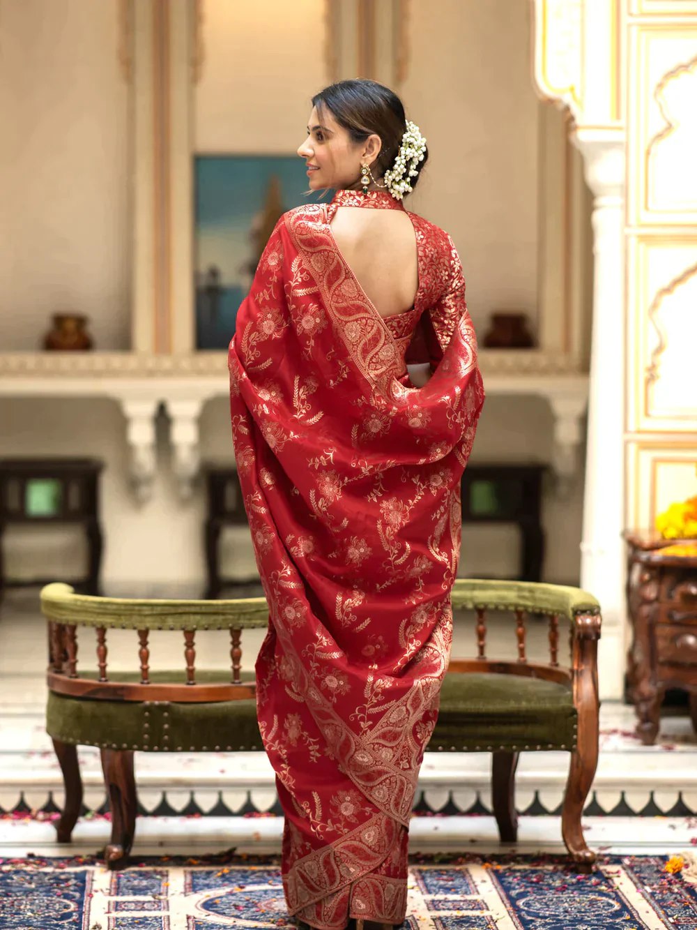 The richly crafted border and opulent pallu showcase traditional Banarasi Silk sarees