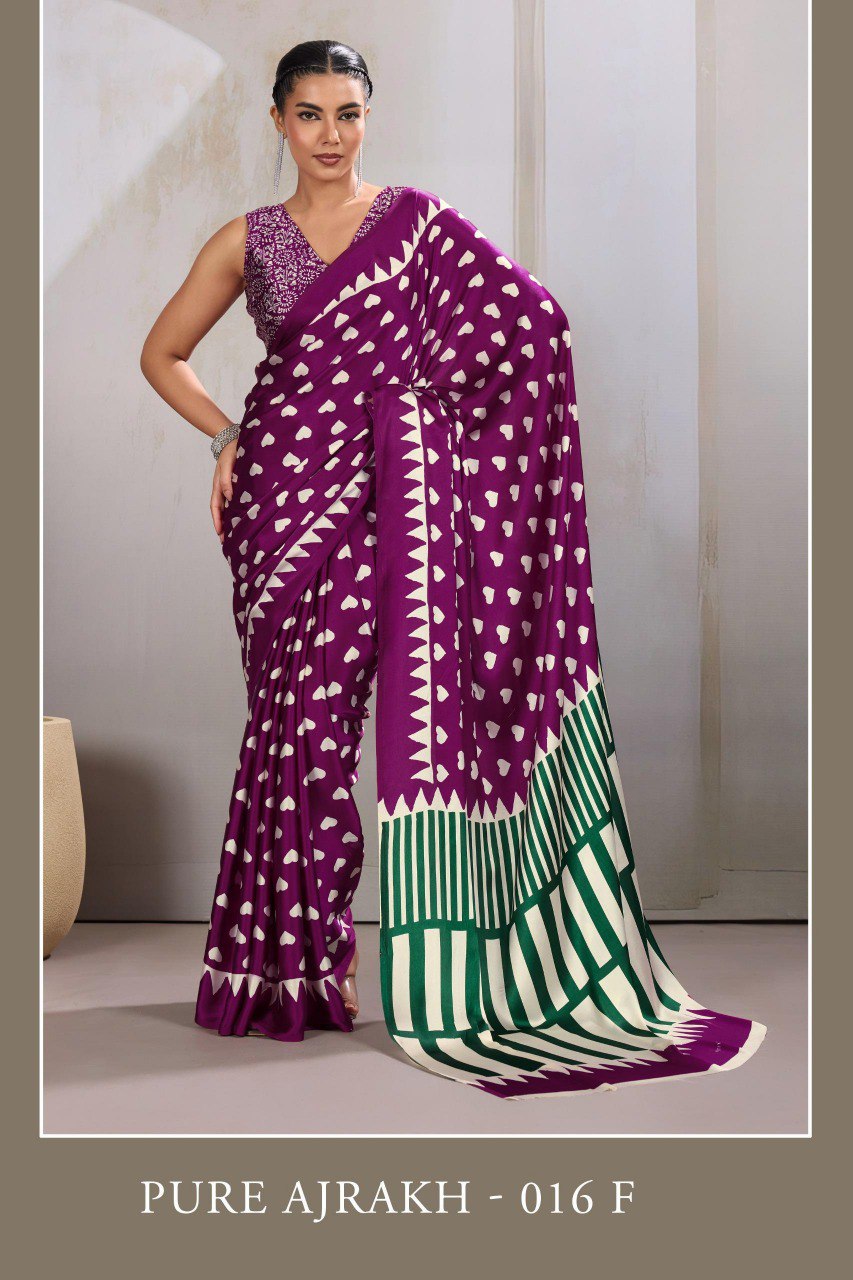 Pure Ajrakh modal satin fabric featuring traditional printed motifs with rich, earthy tones and a soft, breathable feel, perfect for all-day elegance.