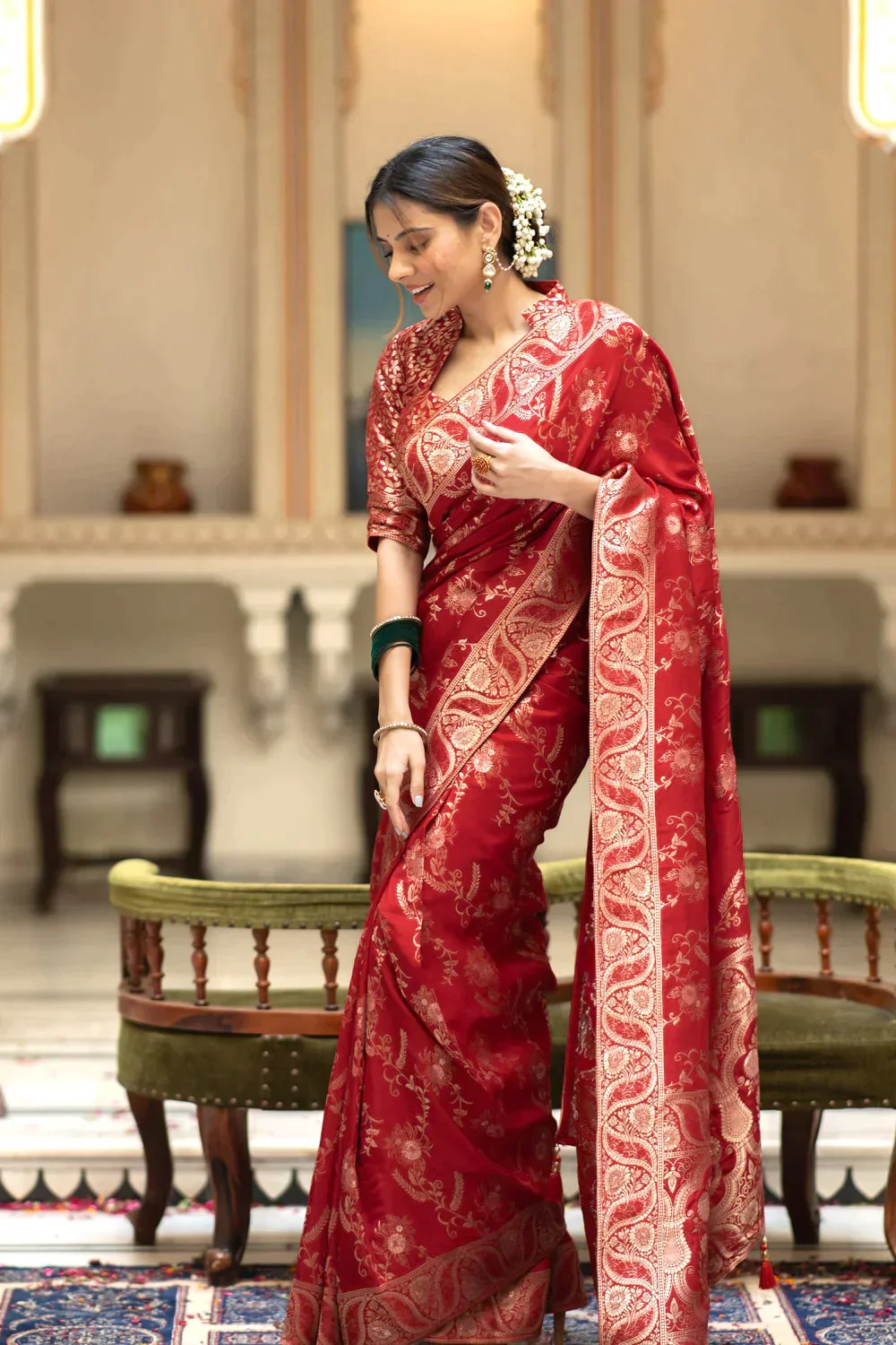The richly crafted border and opulent pallu showcase traditional Banarasi Silk sarees