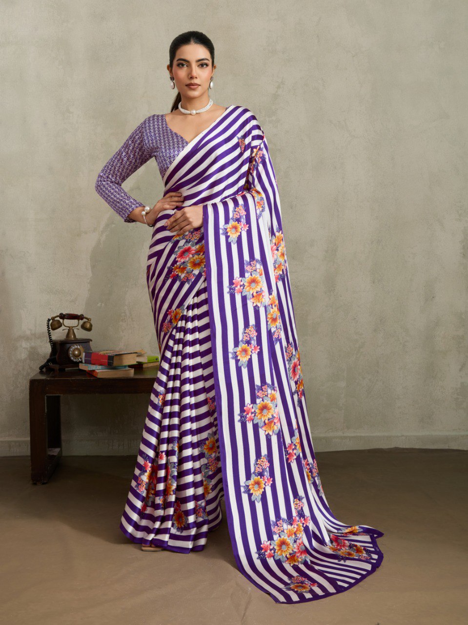Pure Ajrakh modal satin fabric featuring traditional printed motifs with rich, earthy tones and a soft, breathable feel, perfect for all-day elegance.