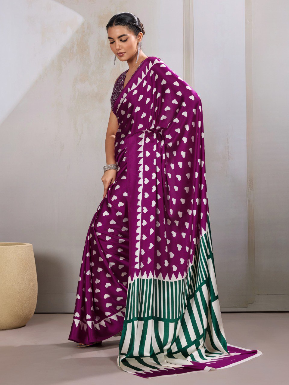 Pure Ajrakh modal satin fabric featuring traditional printed motifs with rich, earthy tones and a soft, breathable feel, perfect for all-day elegance.