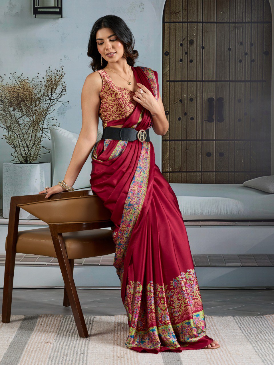 Pure Ajrakh modal satin fabric featuring traditional printed motifs with rich, earthy tones and a soft, breathable feel, perfect for all-day elegance.