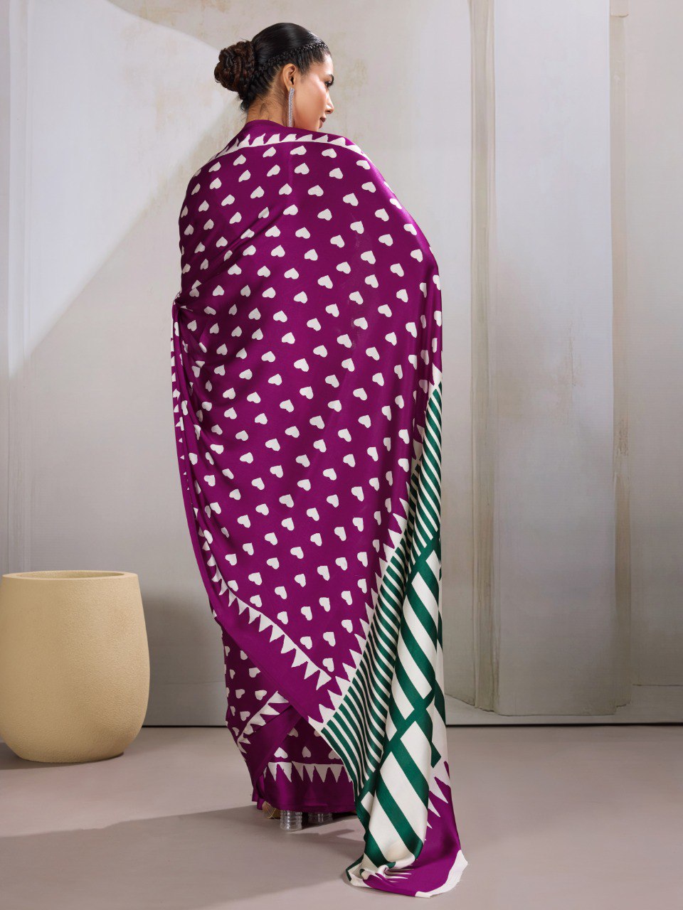 Pure Ajrakh modal satin fabric featuring traditional printed motifs with rich, earthy tones and a soft, breathable feel, perfect for all-day elegance.