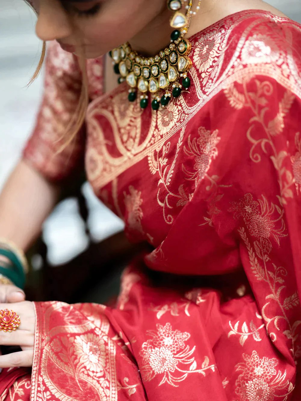 The richly crafted border and opulent pallu showcase traditional Banarasi Silk sarees