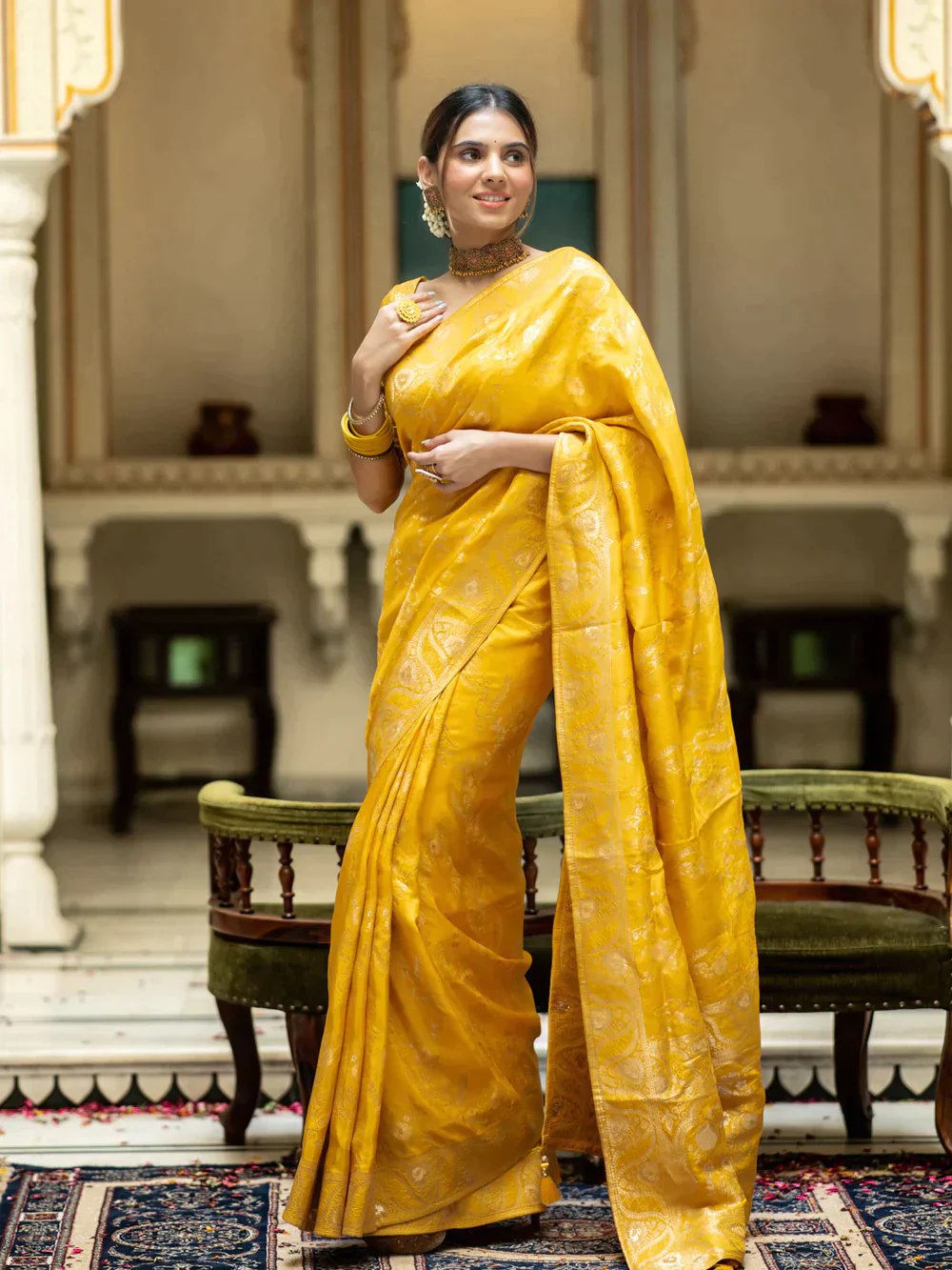 The richly crafted border and opulent pallu showcase traditional Banarasi Silk sarees