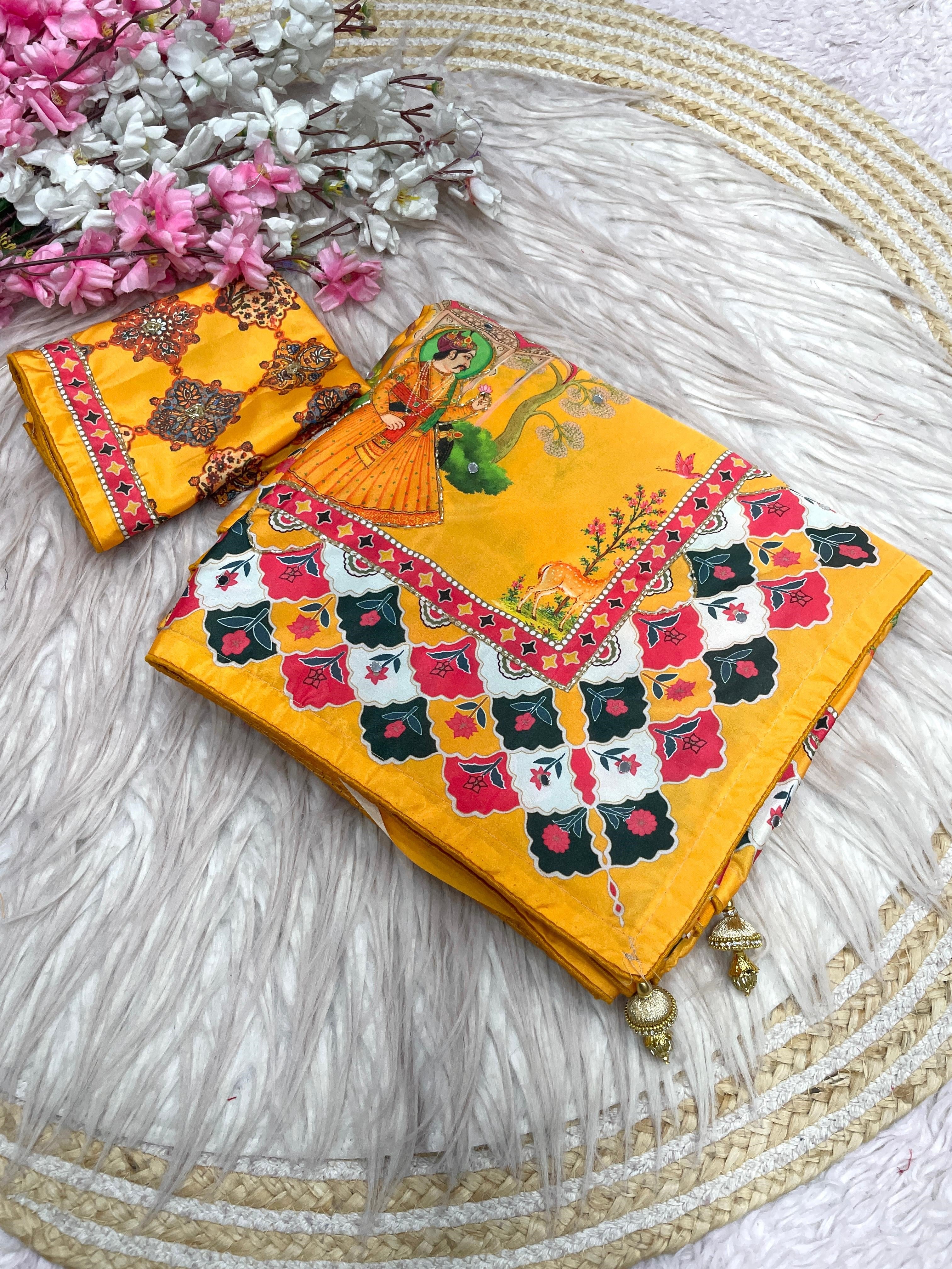 These Bollywood-style satin silk sarees feature vibrant Pichwai digital prints and  handwork