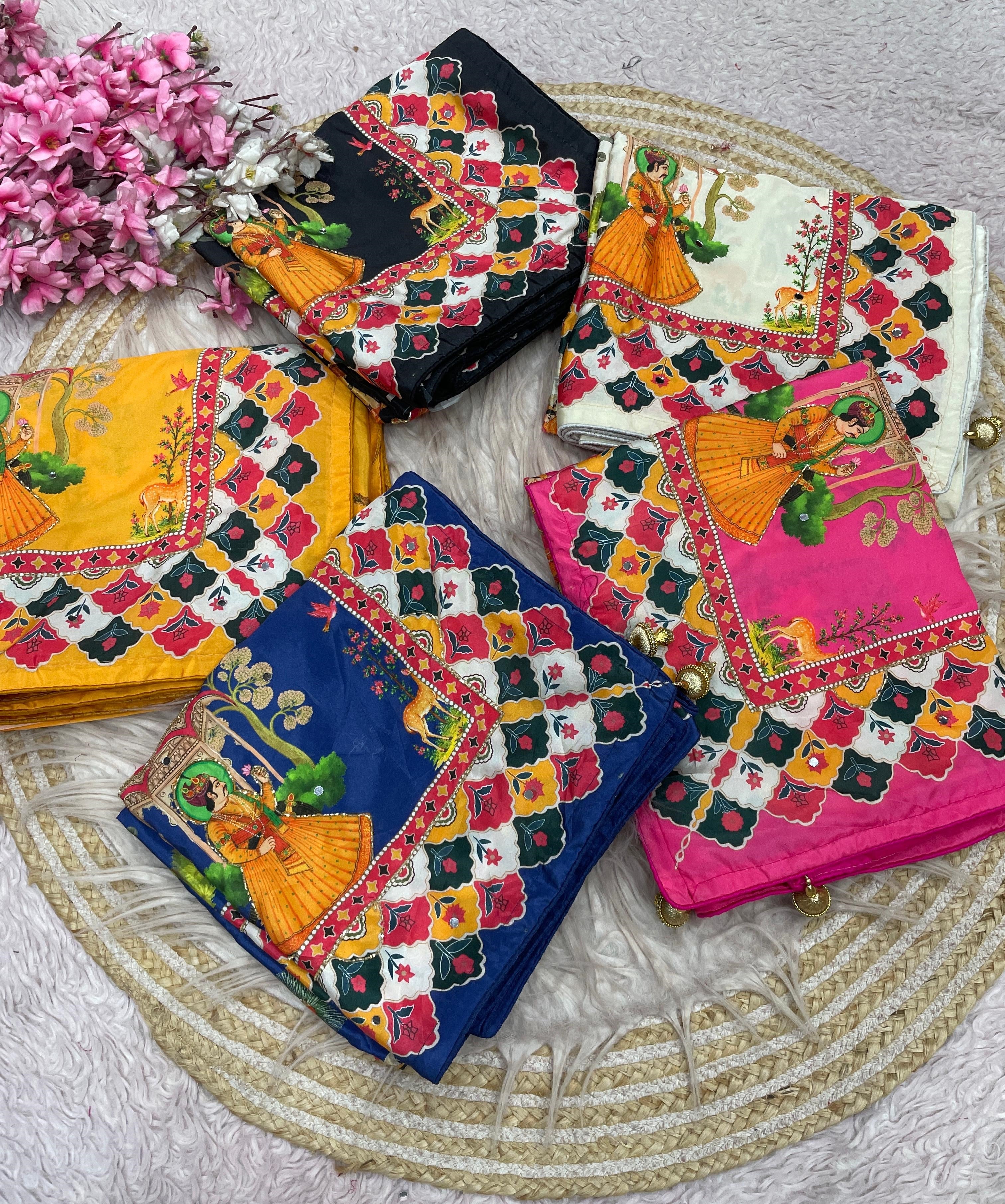 These Bollywood-style satin silk sarees feature vibrant Pichwai digital prints and  handwork