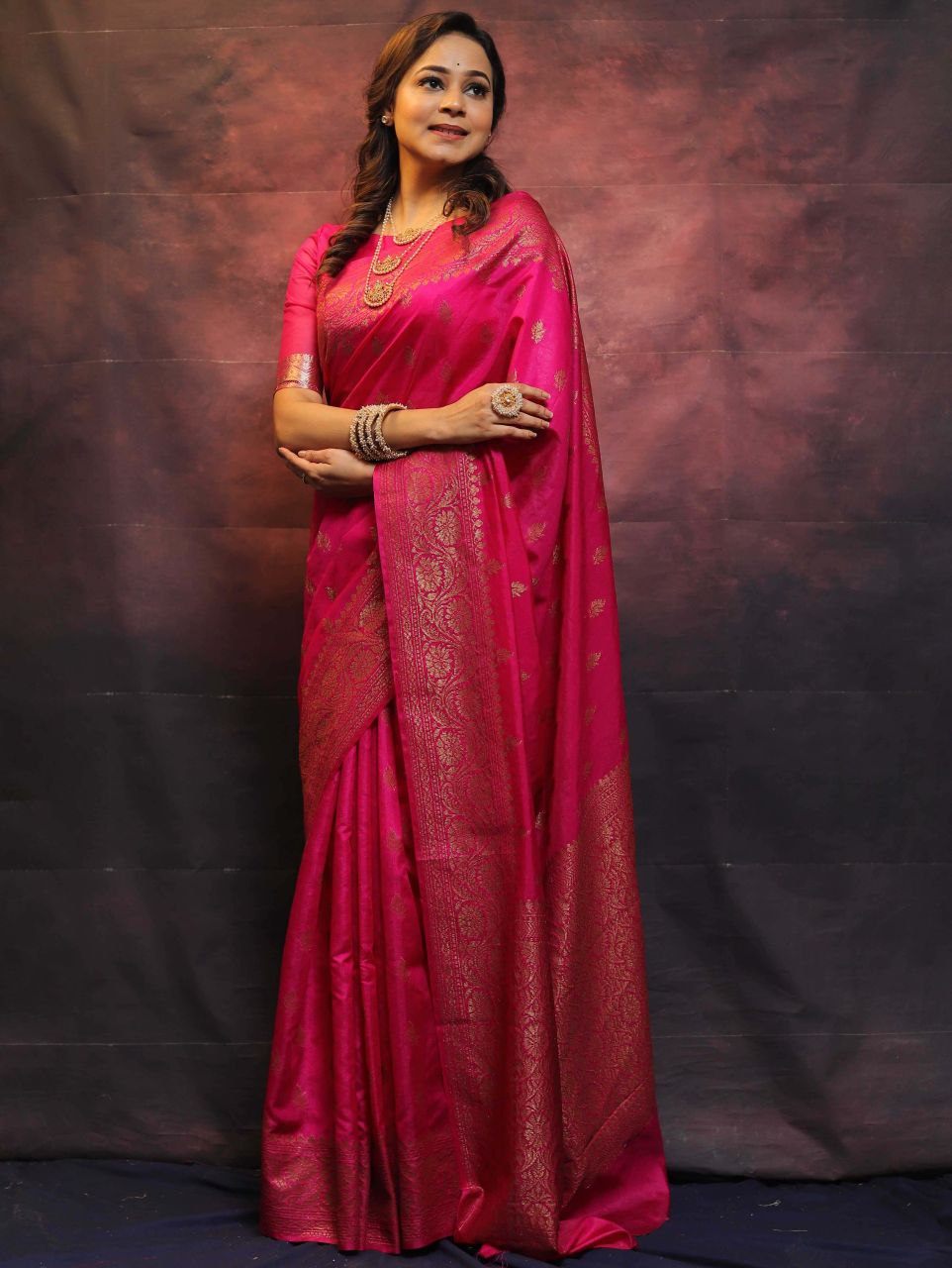 Elegant Banarasi Silk Saree with Rich Golden Zari Work