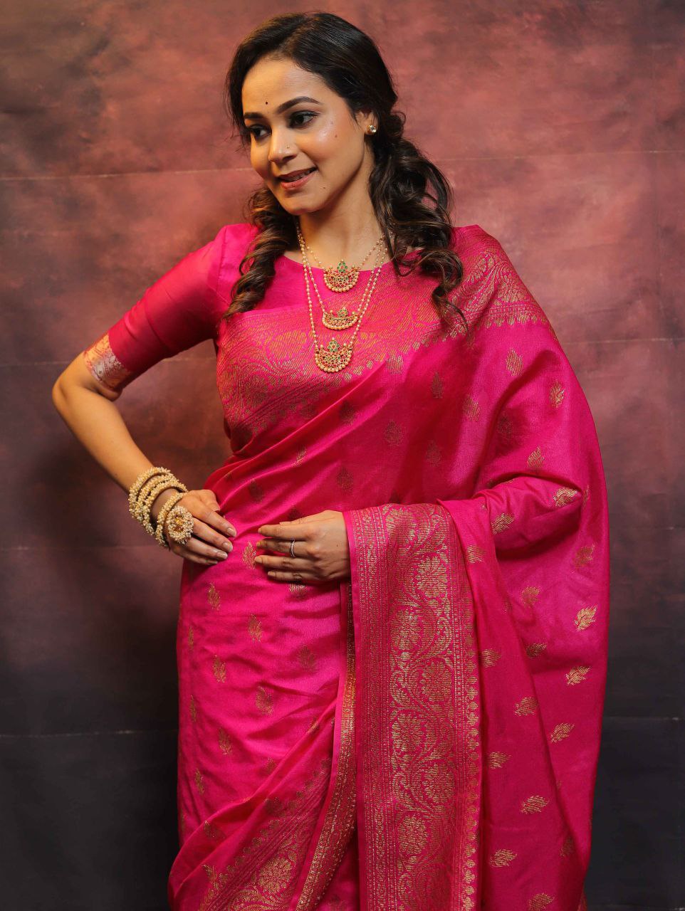 Elegant Banarasi Silk Saree with Rich Golden Zari Work