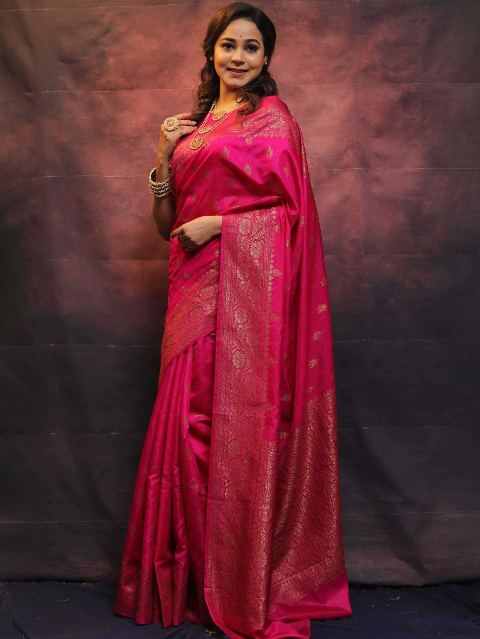 Elegant Banarasi Silk Saree with Rich Golden Zari Work