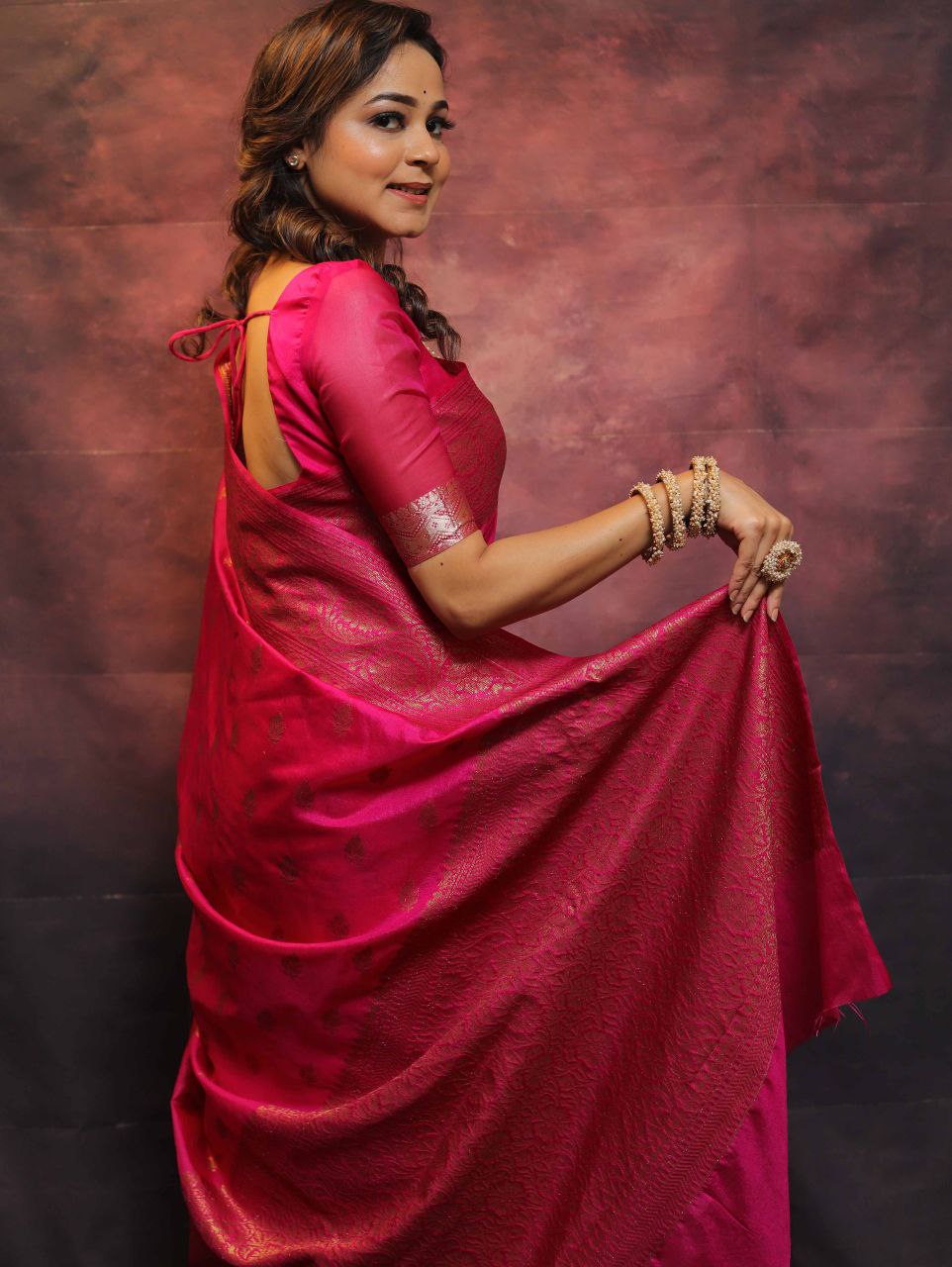 Elegant Banarasi Silk Saree with Rich Golden Zari Work