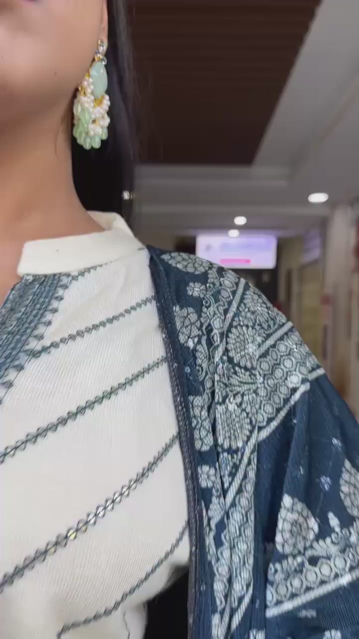 Peach Kurti 3 pair Set you've described seems to be a party wear outfit made from Maslin fabric with digital prints Maslin Duptta.