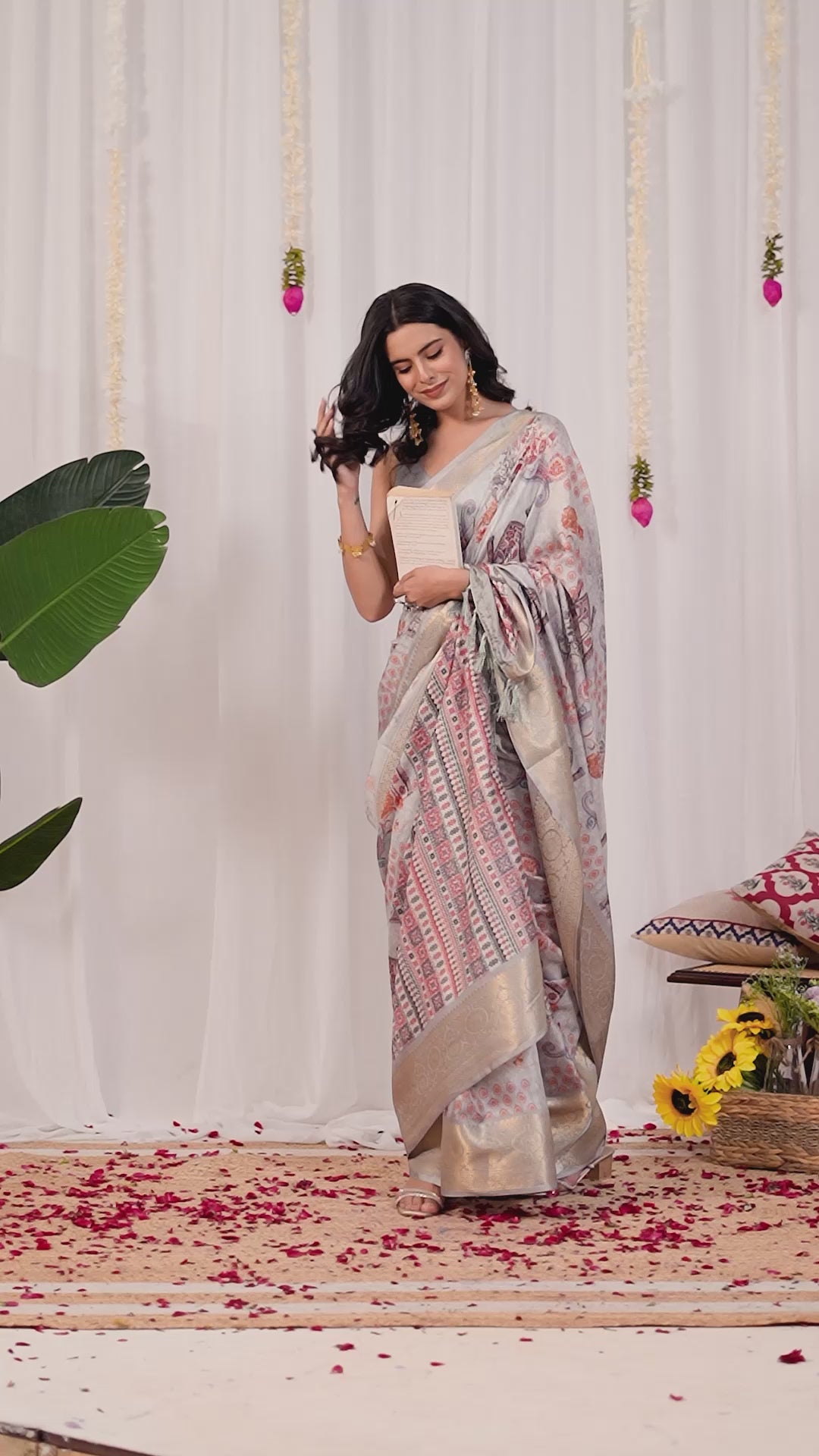 Elegant Soft Lichi Silk Saree featuring royal ethnic motifs with a lavish golden zari woven border, bringing together rich heritage and modern sophistication.