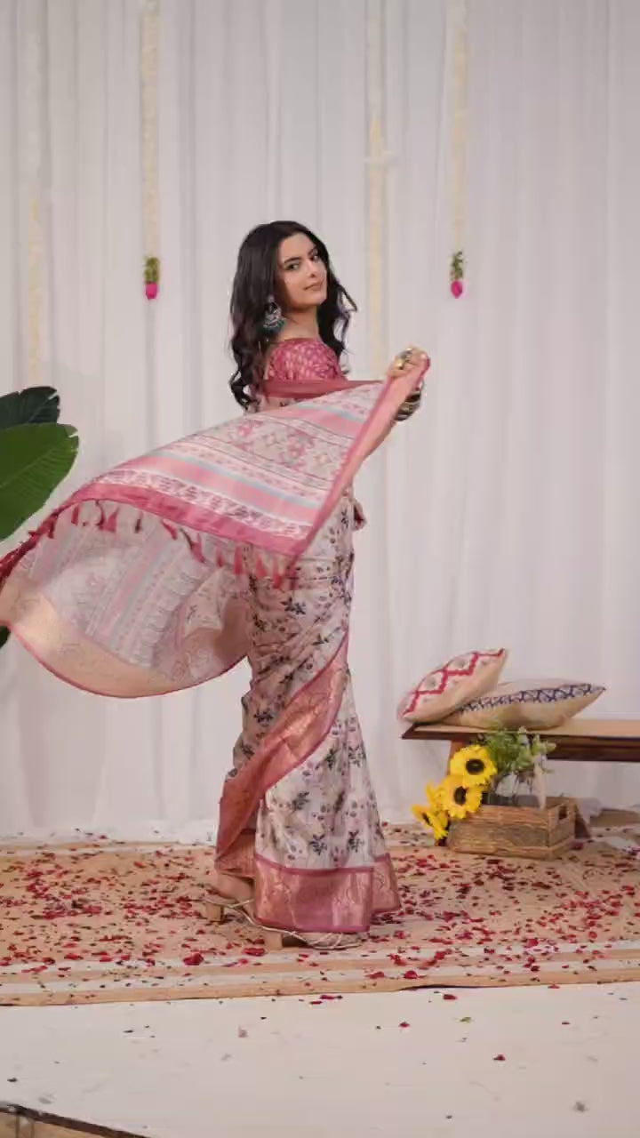 Premium Soft Lichi Silk Saree featuring mesmerizing floral digital prints beautifully enhanced with an elegant contrast zari woven border.