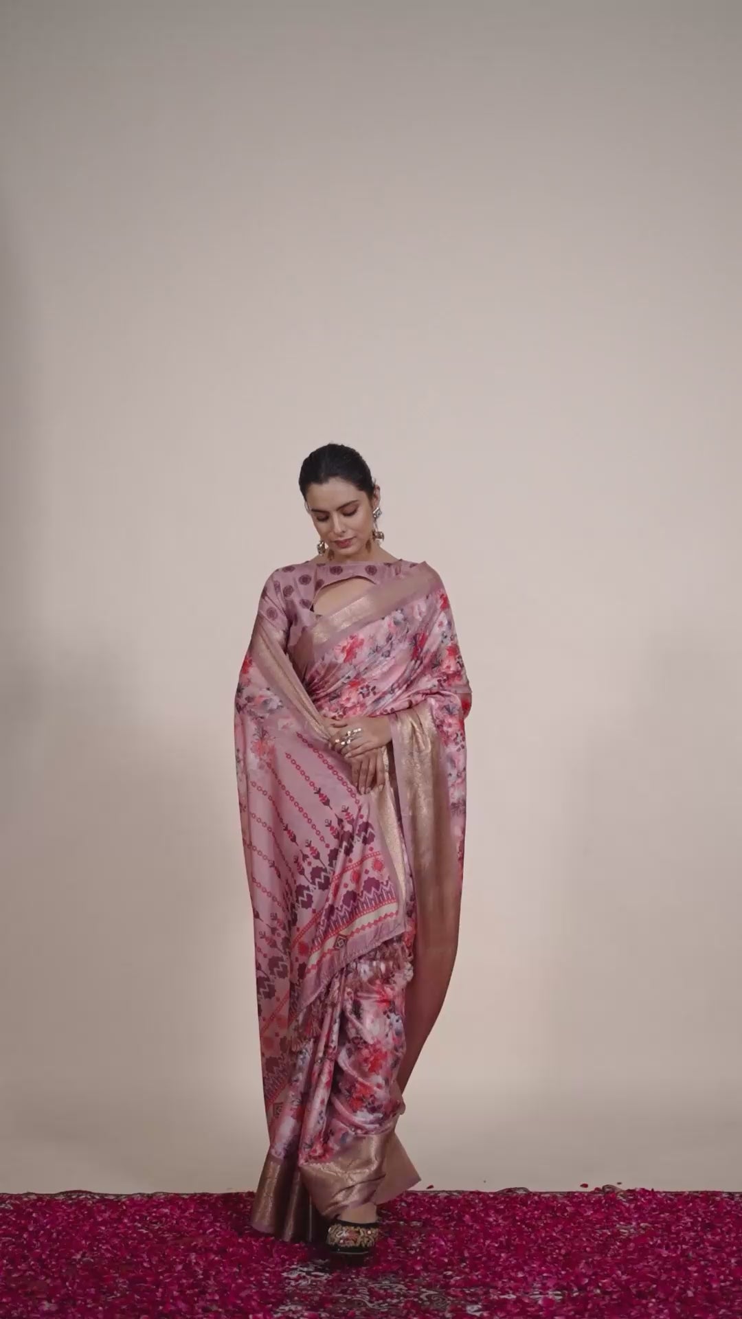 Gorgeous Soft Lichi Silk Saree with enchanting digital floral prints and a rich golden zari border.