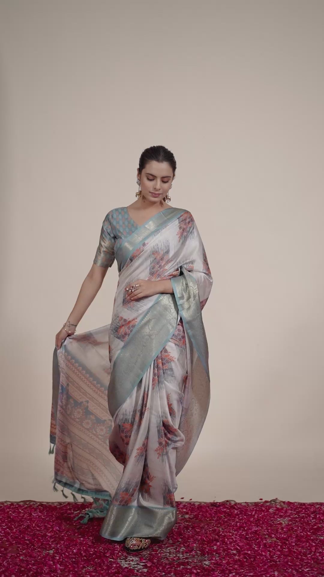 Elegant Soft Lichi Silk Saree in a refined ivory and teal tone, featuring traditional motifs and intricate digital prints enhanced with a golden zari border.