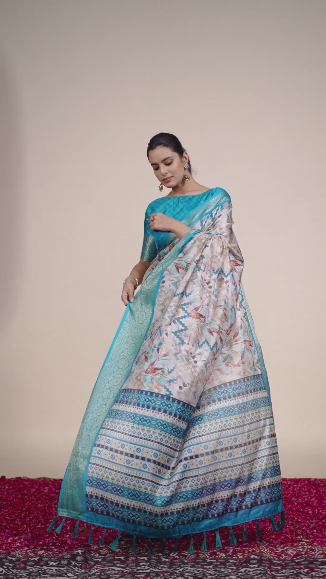 Soft Lichi Silk Saree featuring an Exquisite Combination of Modern Digital Print and Rich Traditional Zari Woven Border.