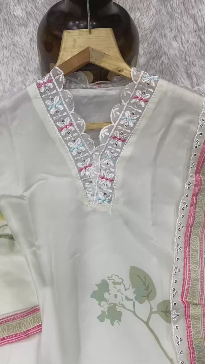 Off White  Color Suit Set  seems to be a party wear outfit made from TB Silk fabric with digital Prints TB Silk Duptta wih Embroidery sequence Lace.(3-Pair)