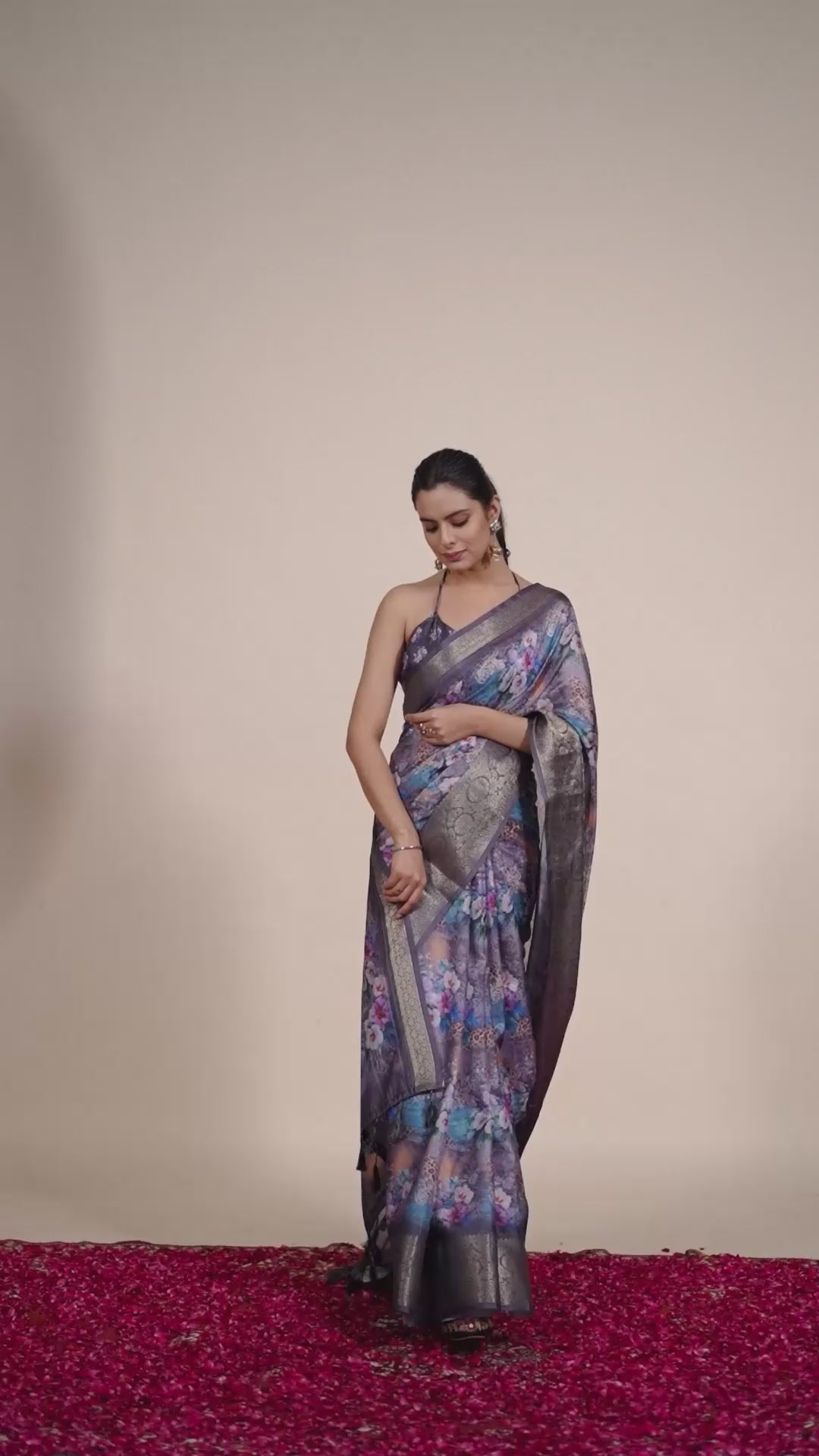Gorgeous Soft Lichi Silk Saree featuring enchanting digital floral prints on a rich smoky grey base with an intricate golden zari border.